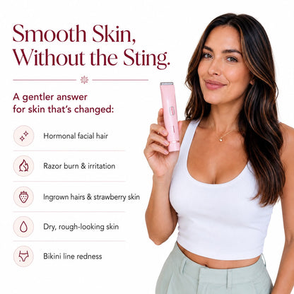 Woman holding a pink women's body trimmer designed for sensitive skin to help reduce razor burn, ingrown hairs, and bikini line irritation.